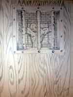 Sketch of prisoner bound to a wall in a cell